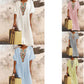 Casual and loose-fitting dress for women, made of cotton and linen with embroidery and a slit.