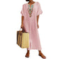 Casual and loose-fitting dress for women, made of cotton and linen with embroidery and a slit.
