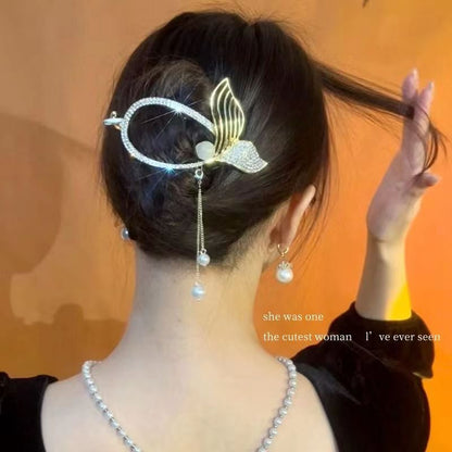 Elegant fishtail hair clip with tassels