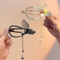 Elegant fishtail hair clip with tassels